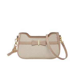 Chic beige woven shoulder bag with pink leather trim and decorative bow gold hardware