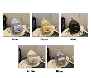 Mini quilted leather backpacks set in blue, yellow, black, white, and silver with chain straps