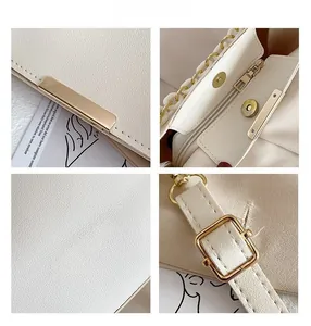 Detail showing smooth PU leather texture, gold hardware, and inner zipper pocket