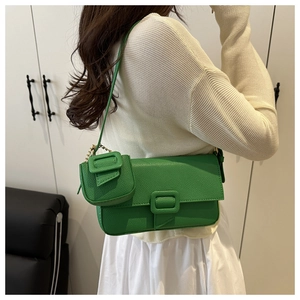 Bright green lychee grain leather shoulder bag with mini coin purse on gold chain