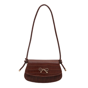 Brown crocodile embossed leather crossbody bag with elegant golden bow metal buckle