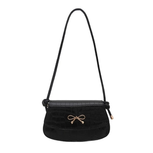 Elegant black crocodile pattern underarm bag with a golden bow metal accessory