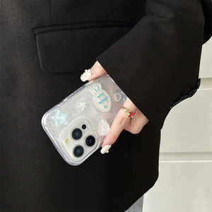 Detail of iPhone case with 3D sea stars and glitter shell texture held by a person