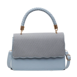Stylish blue leather handbag with grey woven flap and round top handle for daily commuting