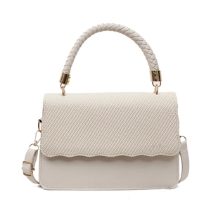 Minimalist beige crossbody bag with woven flap detail and gold-tone hardware for women