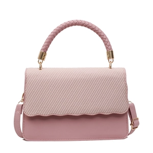 Elegant pink shell-shaped evening handbag with woven texture and round top handle