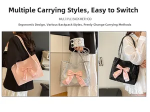 Detail view of large bow ornaments on soft tote bags in pink, silver, and black colors