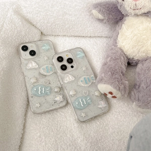 Detailed view of ocean theme iPhone case with 3D fish, shells and glitter accents