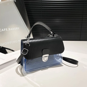 Blue jelly crossbody bag with transparent quilted pattern and black striped flap cover