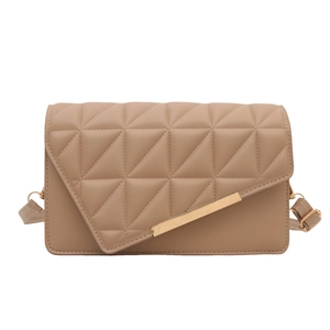 Quilted beige crossbody bag with geometric triangle patterns and gold metal bar accent