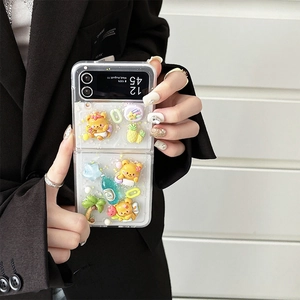 Detail of 3D resin bear and tropical fruit charms on a clear foldable Samsung phone case