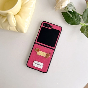 Macro detail of magenta leather phone case with cute dachshund puppy embroidery for Z Flip