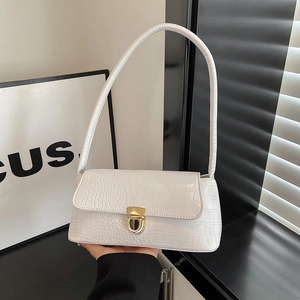 White crocodile pattern shoulder bag for women with gold clasp and elegant minimal design