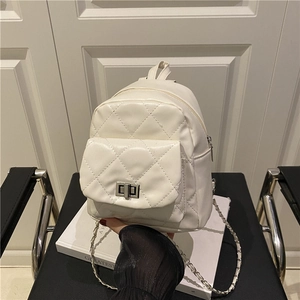 White quilted mini backpack with metal chain strap and twist lock for women