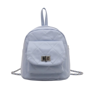 Quilted light blue mini backpack featuring classic diamond stitching and chain strap