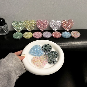 Colorful heart and round glitter phone grip stand set in various sparkling pastel colors