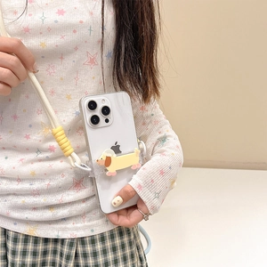 Detail of a 3D dachshund phone stand with adjustable yellow and white braided crossbody strap