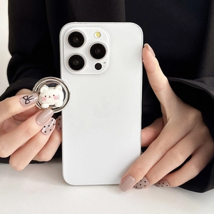 Close-up of white 3D cartoon bear phone ring holder attached to a slim protective case