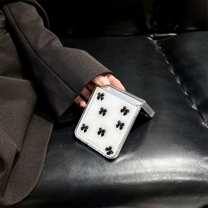 Detail showing 3D black bows on a clear transparent case for Samsung Galaxy Z Flip