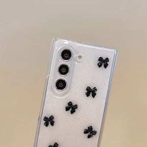 Detail of transparent glitter phone case with 3D black bows for Samsung Z Flip 6