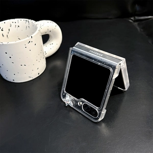 Close-up of glittery transparent Samsung Z Flip case with a hanging 3D star charm