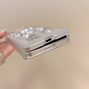 Detail view of precise charging port cutouts on a glitter pearl Z Fold phone case