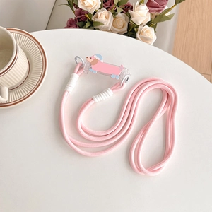 Close-up of pink woven crossbody strap with a cute cartoon dachshund acrylic clip detail