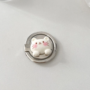 Detail of silver metal phone ring holder with a cute white cat design and pink accents