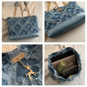 Detail of gradient star denim bag showing interior capacity for phone and wallet