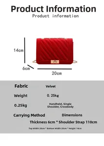 Detail of red velvet crossbody bag with V-shaped quilting and gold chain strap