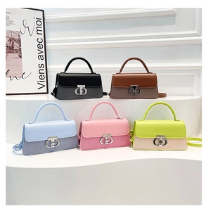 Detailed close-up showing five textured mini crossbody bags in various trendy colors