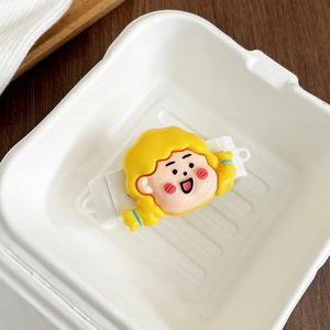Detailansicht eines süßen Comic-Mädchen-Handyzubehörs in kreativer Verpackung