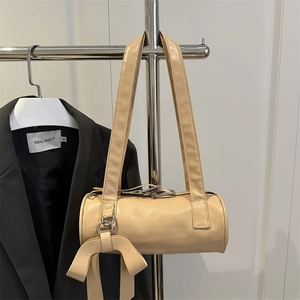 Borsa a spalla cilindrica beige con fiocco decorativo grande in stile coreano sobrio