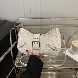 French style white crocodile embossed crescent shoulder bag with silver buckle detail