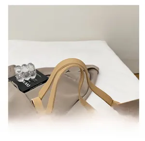 Macro shot of comfortable tote bag handle with refined stitching and premium PU leather texture