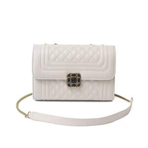 Elegant beige quilted crossbody bag with vintage gold chain strap and square black gem buckle