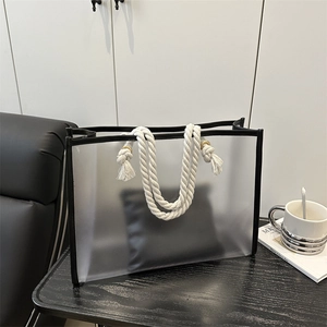 Minimalist frosted PVC tote bag with thick cotton rope handles and internal pouch