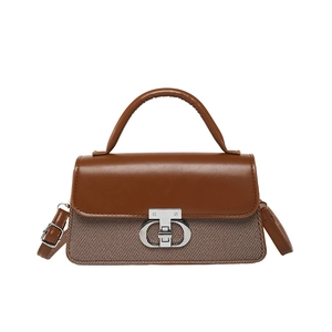 Brown patchwork contrast handbag with silver twist lock and textured fabric finish
