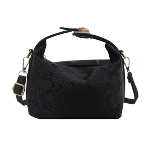 Elegant black python texture pillow bag with gold hardware and adjustable strap