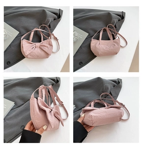 Detailed four-view display of a pink nylon handbag featuring a large decorative bow design