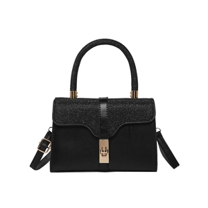 Elegant black handbag with glitter flap, golden lock, and top handle for women