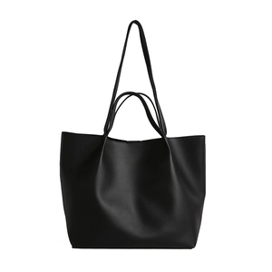 Minimalist black PU leather tote bag with slim shoulder straps for daily casual commuting