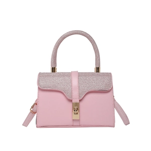 Elegant pink matte leather handbag with glitter flap and golden lock for women