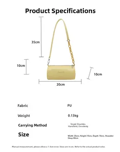 Détails du sac cylindre jaune en similicuir avec dimensions et chaîne ambre déco