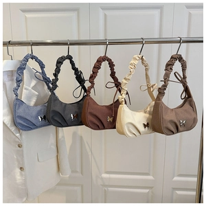 Collection of butterfly shoulder bags in five colors with bow knotted straps