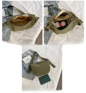 Detail showing spacious interior of military green crescent bag with daily essentials
