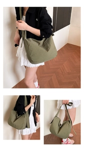 Detail of army green pleated nylon crossbody bag showing texture and wide strap