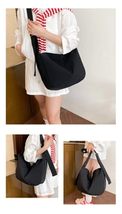Detailed views of a black large capacity nylon crossbody bag with adjustable wide strap
