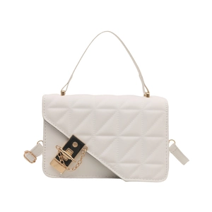 White quilted crossbody bag with minimalist geometric flap and gold metal chain hardware