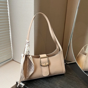 Chic beige crocodile texture baguette bag with silk scarf on the shoulder strap